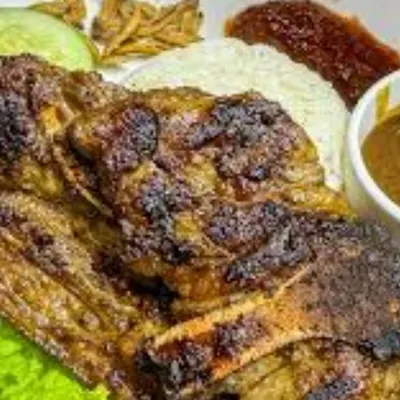 A24. Nasi Lemak Lamb Shoulder - Village Grill Menu