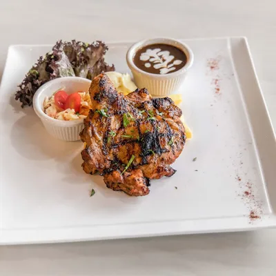 C02. Cheezy Charcoal Grilled Chicken Chop - Village Grill Menu