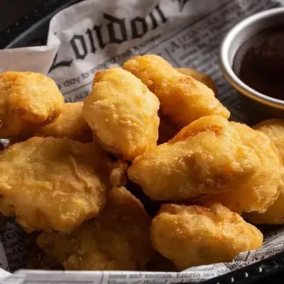 SK09. Chicken Popcorn - Village Grill Menu