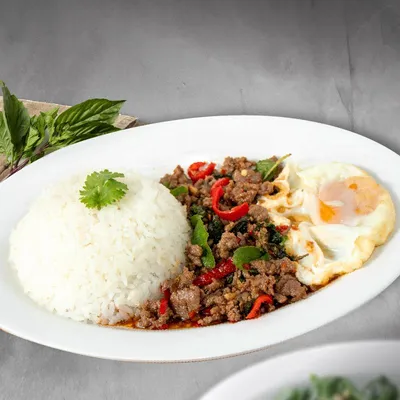 TR10. Pad Kra Paw Minced Beef with Rice - Johnny's Restaurant Menu